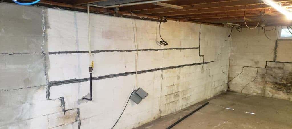 Bowing basement walls are very common in Ohio due to the clay soil conditions. Clay soil contrasts when it's dry and expands when it's wet, the more rain the wetter the soil, the more the soil will expand eventually the basement walls will bow, tilt and break.